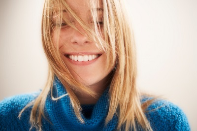 Women smiling after recieving sinus lift implants at Martin Periodontics 