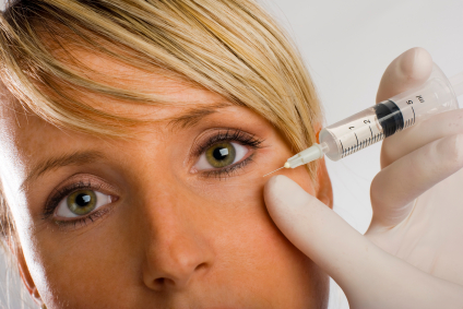 A woman receiving botox at Martin Periodontics in Mason, OH.