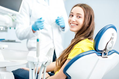 Women receiving advanced dental implant procedures at Martin Periodontics 