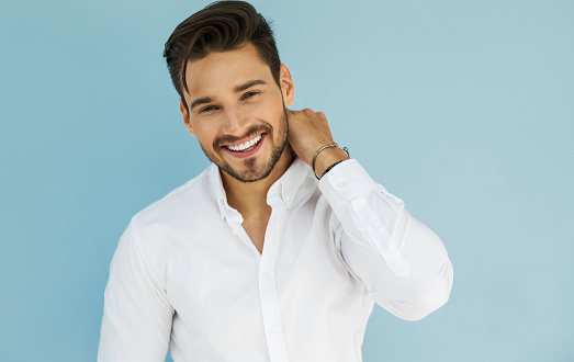 Man smiling after recieving Ridge Augmentation treatment at Martin Periodontics 