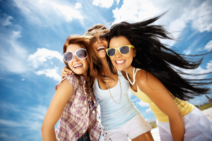 Three women smiling after receiving cosmetic dentistry treatments at Martin Periodontics in Mason & North Cincinnati, OH. Three women smiling after receiving cosmetic dentistry treatments at Martin Periodontics in Mason & North Cincinnati, OH.